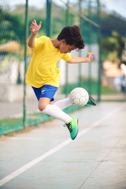 Child playing soccer